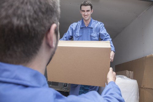 Packed boxes and furniture ready for removals in Manor House