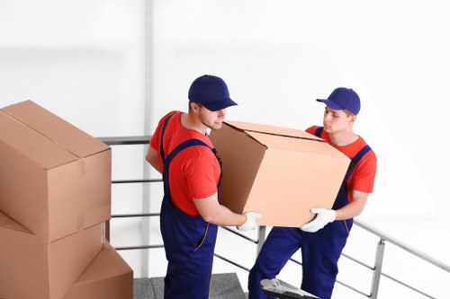 Moving home in Manor House with boxes and furniture ready for transport