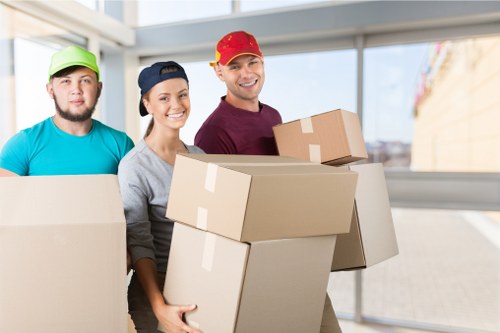 Removal van and movers working near Manor House residential streets