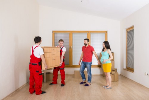 Loading household goods into a van for transport