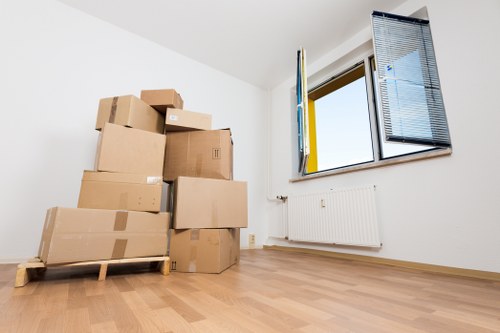 Local movers packing furniture and fragile items in Manor House