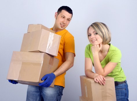 Local removals crew handling a house move in North London