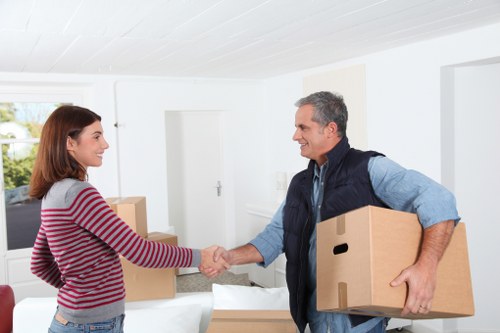 Removals team managing loading and parking on a busy North London road