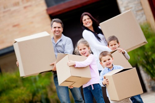 Packed boxes and furniture ready for a house move in Manor House