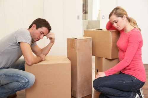 Packed boxes and moving van prepared for a residential move in Manor House