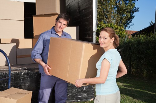 Careful unpacking of household items in a Manor House property