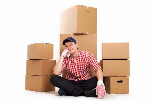 Organised office move setup with labelled boxes and furniture